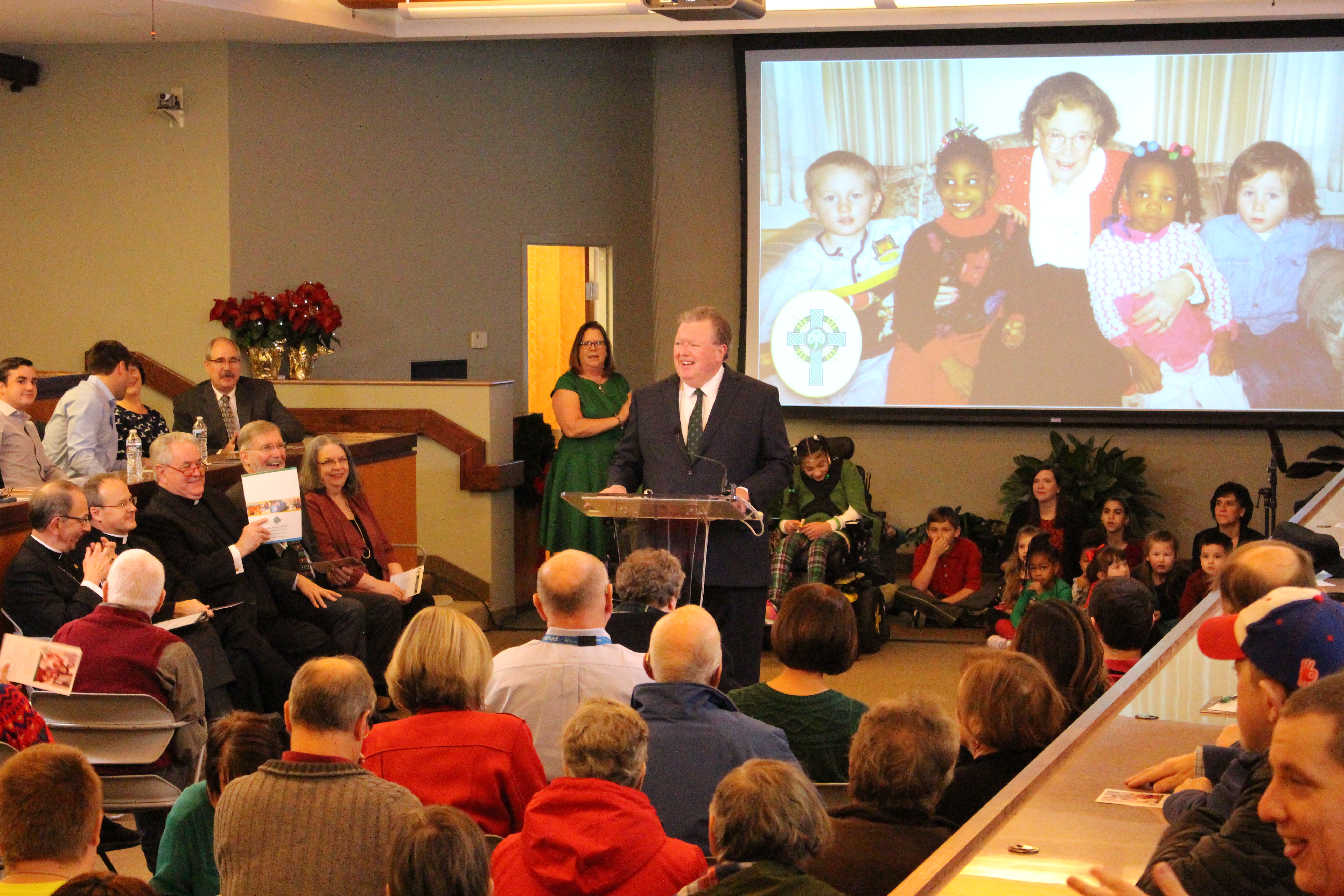 Barber National Institute President John Barber introduces speakers at a presentation where Bishop Lawrence Persico, Bishop of the Erie Diocese, announced the opening of the cause for canonization for Gertrude A. Barber.